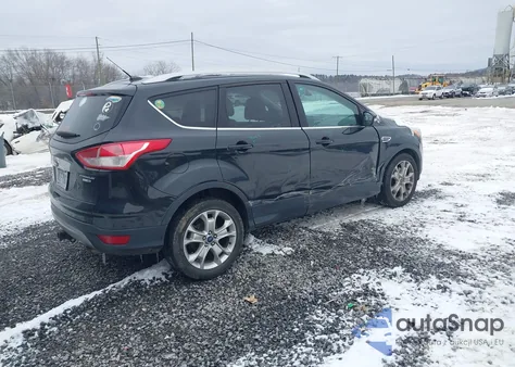 2015 Ford Escape Titanium z USA, uszkodzony, nr VIN 1FMCU9J91FUC20067
